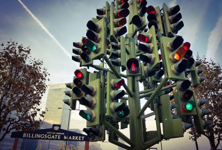 Why Do We Use Red, Green, and Yellow Colors In Traffic Lights?